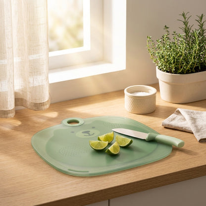 Slicewell™ Double-Sided Plastic Cutting Board in a calm home setting