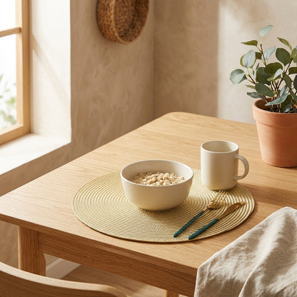 Dineweave™ Round Woven Plastic Placemat in a calm home setting