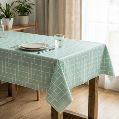 Plaidle™ PEVA Plaid Dining Tablecloth, styled close view