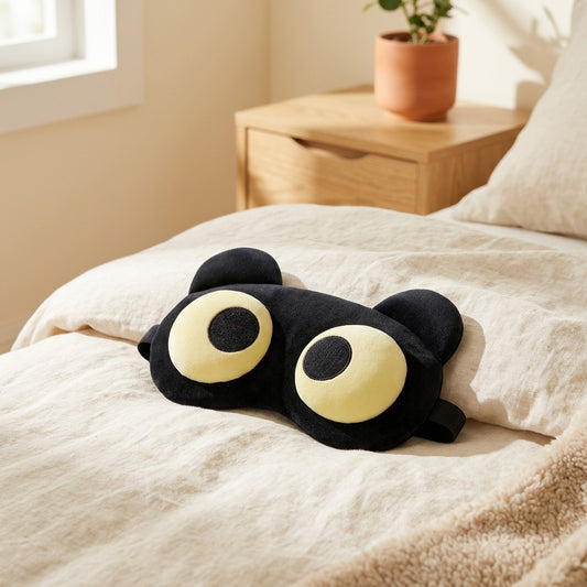 Slumbrella™ Light-Blocking Eye Mask in a calm home setting