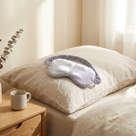 Reversible™ Double-Sided Polyester Sleep Mask in a calm home setting