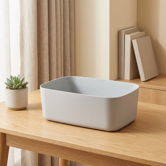 Stowstack™ Stackable Plastic Desktop Storage Box in a calm home setting
