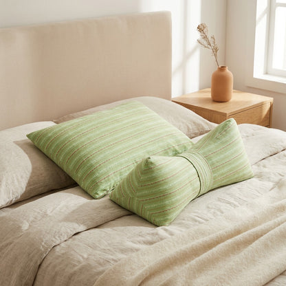 Husknest™ Buckwheat Shell Triangular Pillow in a calm home setting