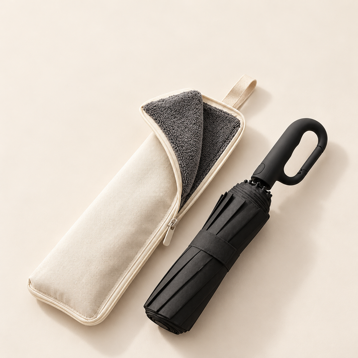 Folded black Haven beside its open absorbent umbrella sleeve