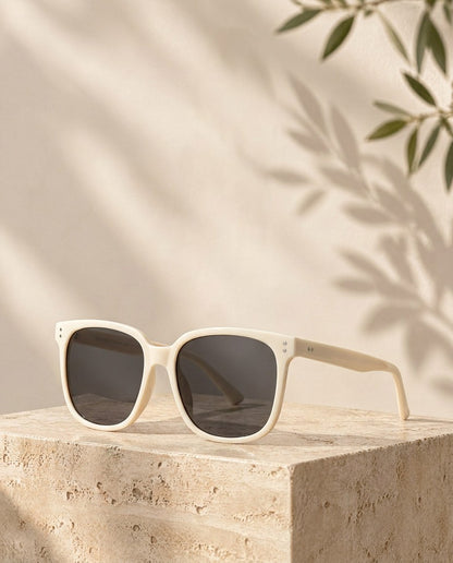 Haven UV400 Sunglasses on a travertine plinth