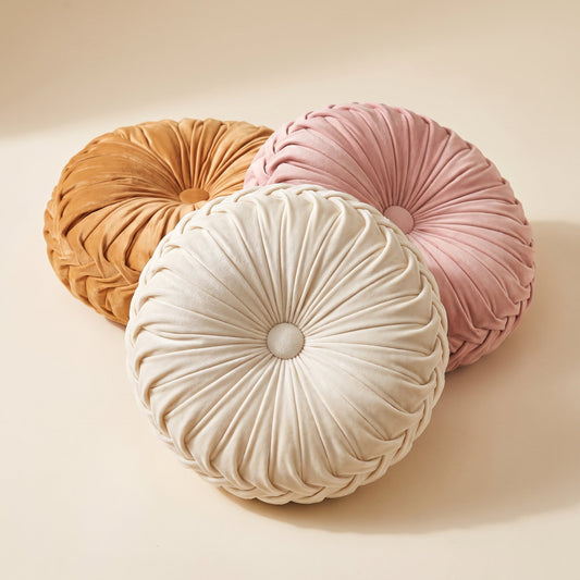 Dahlia™ Velvet Round Cushion — ivory, caramel and blush pleated velvet cushions on warm cream background