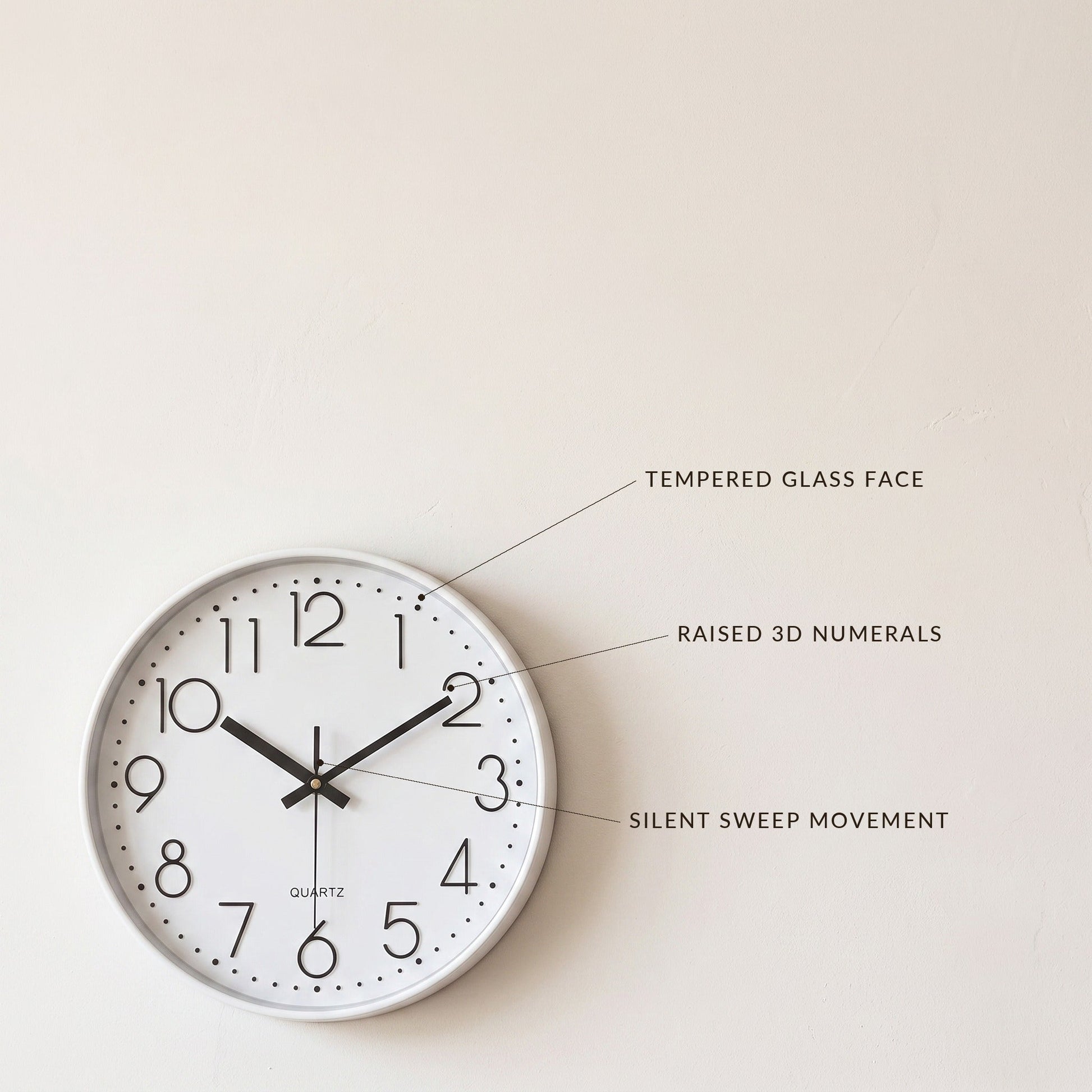 Hush Clock detail callouts: tempered glass face, raised 3D numerals, silent sweep movement