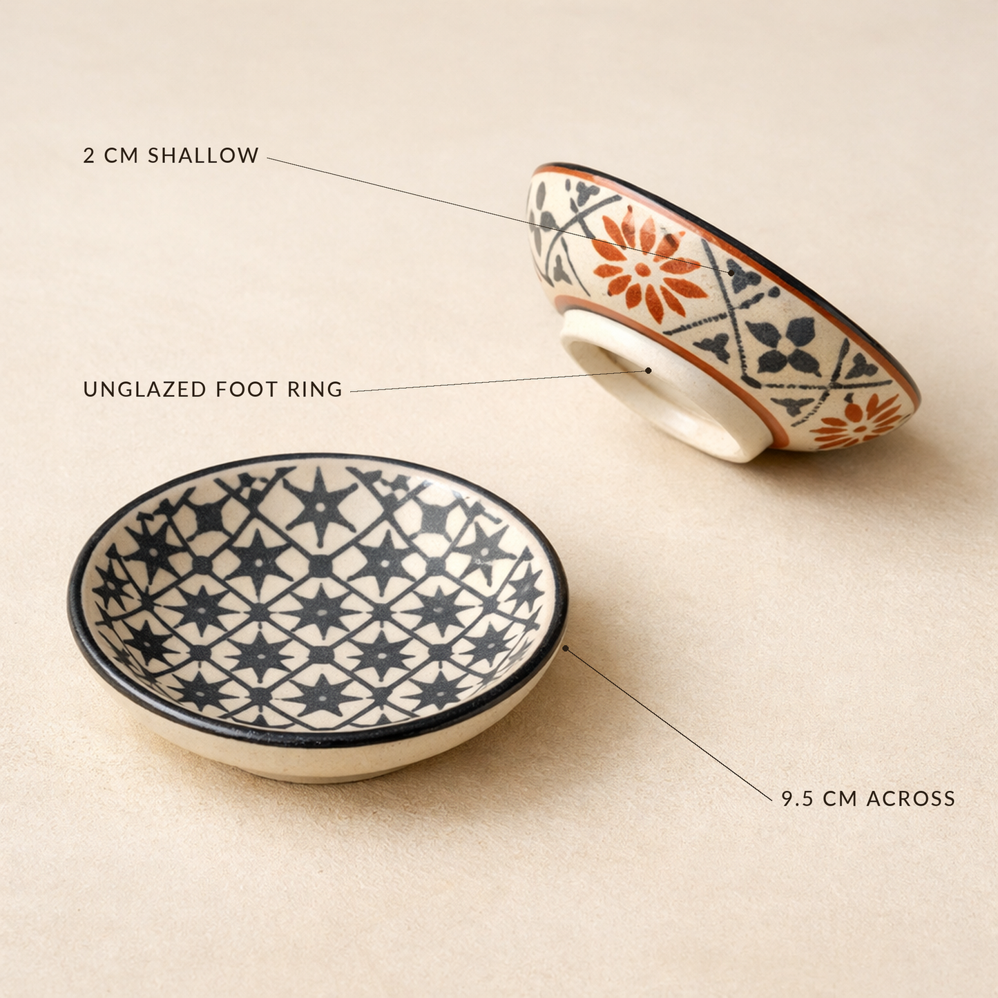 Cove trinket dish dimensions: 9.5 cm across, 2 cm shallow, unglazed foot ring