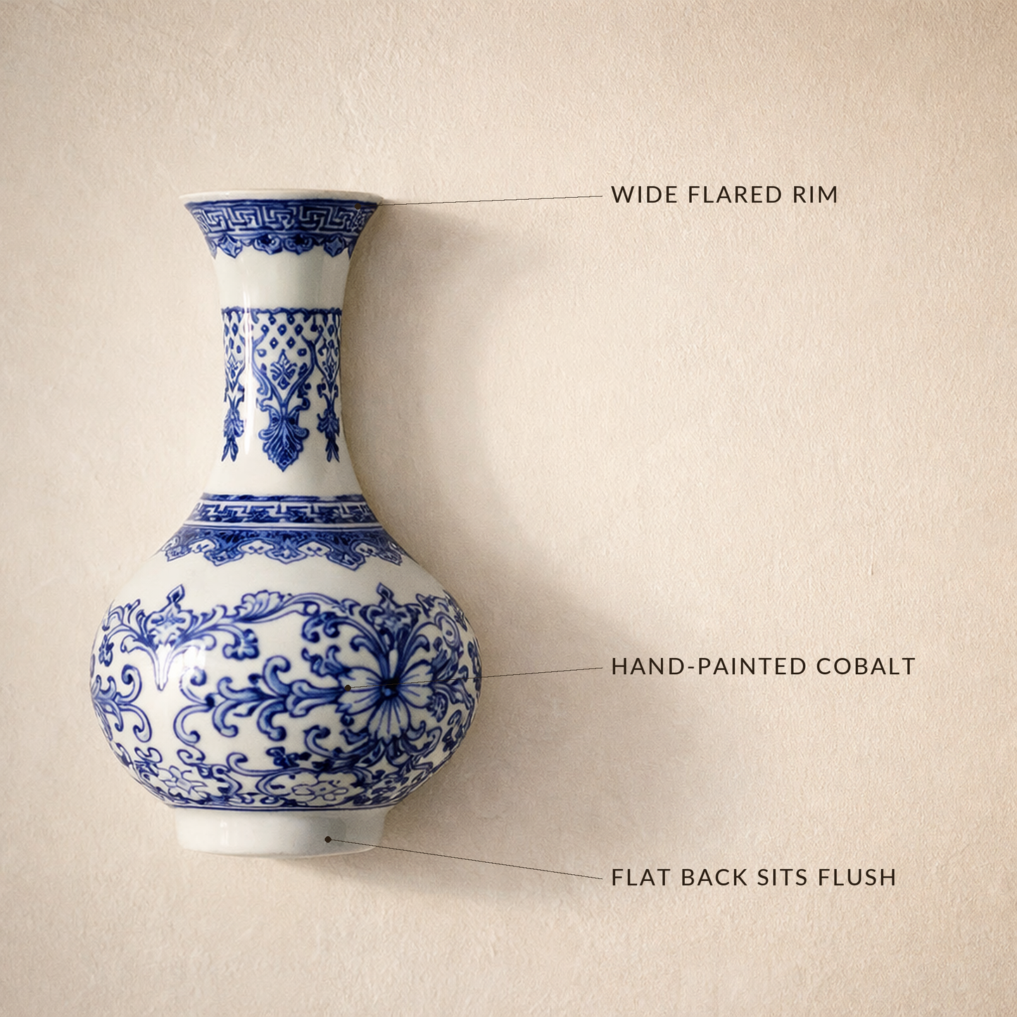 Indigo™ wall vase detail callouts: wide flared rim, cobalt-blue underglaze, flat back sits flush
