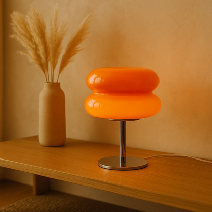Sol lamp glowing on an oak console at golden hour
